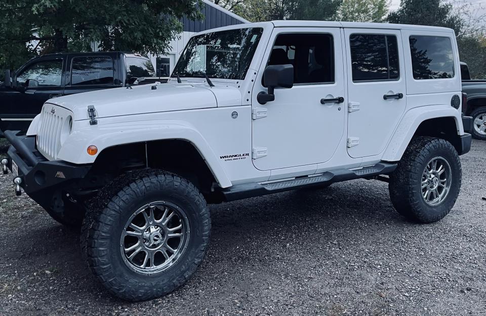 4 Inch Lifted 2011 Jeep Wrangler JK Unlimited 4WD